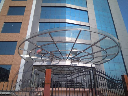 Glass replacement and ACP panel fixing for a hotel and commercial building in Trichy